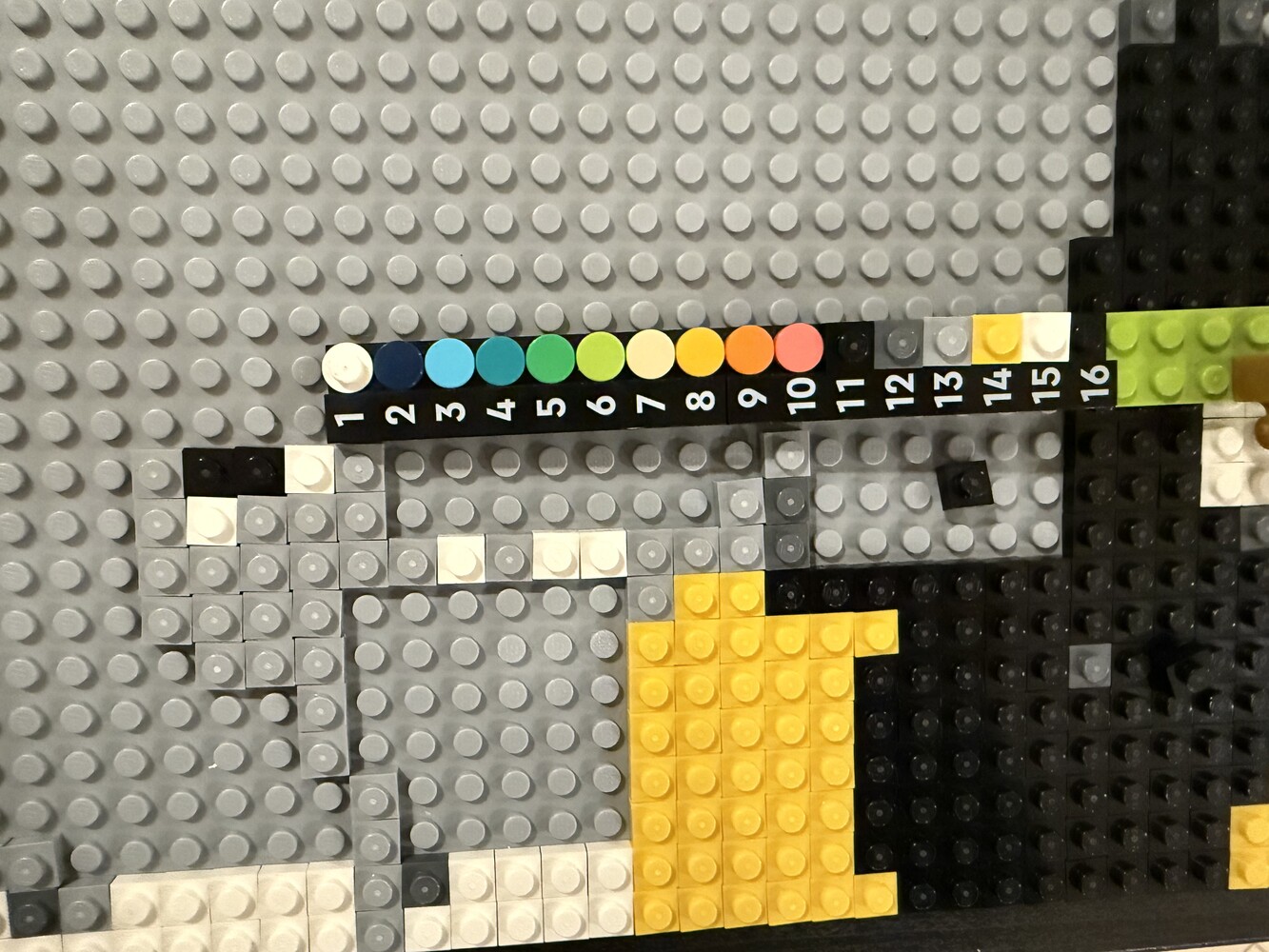 A hand-built Lego ruler with numbered studs 1 through 16