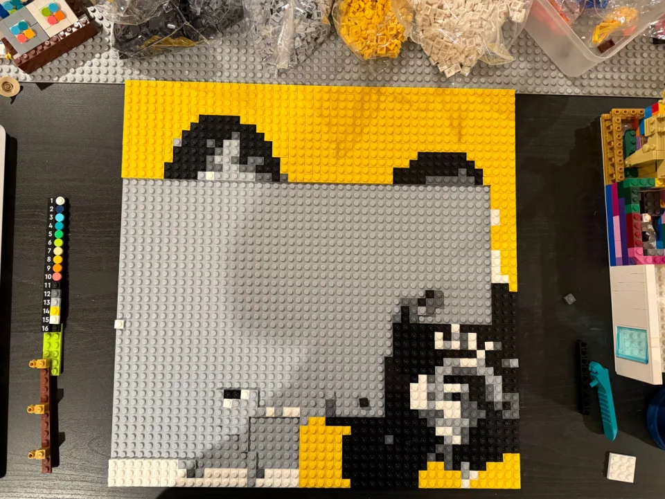 Lego mosaic build in progress on a baseplate, partially filled in
